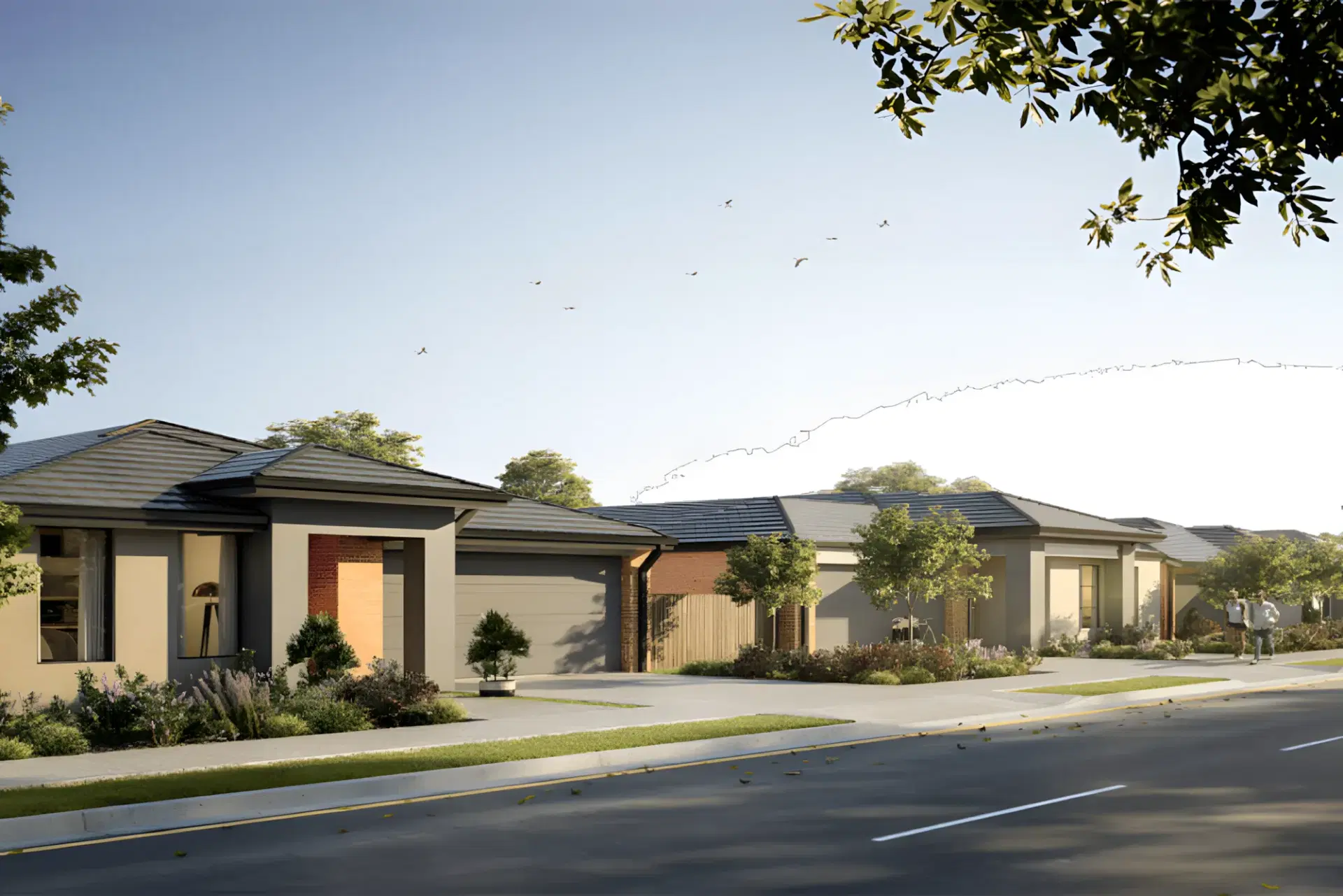 Street of single-storey Deanside homes with rendered facades and landscaped verges